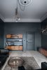 Modern home with Bookcase, Light Hardwood Floor, Rug Floor, and Chair. The study features vintage teak furniture and cozy leather couches. Photo 20 of Interior KG