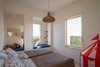 Modern home with Bedroom, Pendant Lighting, Bench, and Bed. Twin bedroom Photo 13 of Cozzo Coniglio