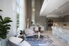 Modern home with Living Room, Chair, Recessed Lighting, and Coffee Tables. Chef-inspired kitchen, formal dining and seating area Photo 2 of Luxe Townhome in Miami's Design District