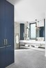 Modern home with Bath Room, Marble Counter, Open Shower, Drop In Sink, and Ceramic Tile Floor. The glazed porcelain star shaped ceramic tile in the master bathroom is by Solistone. The bold pattern was carried from the floor on to the shower walls with a contrasting grout.
We fell in love with Hague Blue by Farrow & Ball. This became our accent color for the entire space. The custom cabinets from Treehouse were finished in Hague Blue, adding a compliment to the otherwise masculine color scheme. Photo 11 of Seaholm Custom Condo