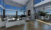 Modern home with Living Room, Ceiling Lighting, Light Hardwood Floor, Sectional, Hanging Fireplace, Gas Burning Fireplace, Recessed Lighting, Medium Hardwood Floor, and Sofa. Side view with city scape of our Magnificent Cantilever Home Photo 4 of Magnificent Cantilever Home For Ocean View Living