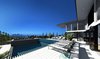 Modern home with Outdoor, Infinity Pools, Tubs, Shower, Large Pools, Tubs, Shower, Lap Pools, Tubs, Shower, and Large Patio, Porch, Deck. Patio and pool view with city scape of our Magnificent Cantilever Home Photo 10 of Magnificent Cantilever Home For Ocean View Living