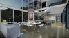 Modern home with Staircase, Stone Tread, Metal Railing, and Concrete Tread. Dining area and bar kitchen of our Magnificent Cantilever Home Photo 18 of Magnificent Cantilever Home For Ocean View Living