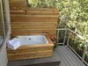 Modern home with Outdoor, Large Patio, Porch, Deck, Decking Patio, Porch, Deck, Planters Patio, Porch, Deck, Hanging Lighting, Horizontal Fences, Wall, and Wood Fences, Wall. Bath on deck Photo 3 of Modern Studio - Pet Friendly