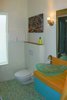 Modern home with Bath Room, Accent Lighting, Wood Counter, Limestone Floor, Ceiling Lighting, Corner Shower, Drop In Tub, One Piece Toilet, and Pendant Lighting. Bathroom with steam shower and stone floor Photo 6 of Modern Studio - Pet Friendly
