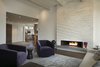 Modern home with Living Room. From the spacious living room into the entry way with a peek of the dining room. Photo 6 of Carmel Valley Vistas