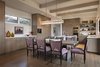 Modern home with Kitchen. The roomy kitchen is open to the dining room, perfect for entertaining. Photo 8 of Carmel Valley Vistas