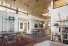 Modern home with Dining Room. The open floor plan flows easily from living room to dining room to kitchen. Photo 6 of Rustic Meets Modern