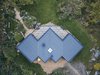 Modern home with Exterior, Metal Roof Material, Flat RoofLine, Wood Siding Material, and House Building Type. drone view Photo 4 of Villa G