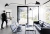 Modern home with Living Room, Concrete Floor, Ceiling Lighting, Sofa, and Coffee Tables. lounge view Photo 2 of Villa G