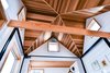 Mitered cedar ceiling, while elevator bed is in the down position. Photo 13 of Not So tiny Tiny, for a Doctor in California modern home