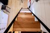Modern home with Staircase, Metal Railing, Metal Tread, and Wood Tread. Hickory and steel stairs. Photo 17 of Not So tiny Tiny, for a Doctor in California