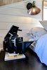 Modern home with Bedroom, Dark Hardwood Floor, Bed, and Wall Lighting. Cork flooring. Tru Form Tiny loft Photo 10 of Full Solar Tiny Home & Open Layout
