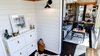 Modern home with Bedroom, Dresser, Wall Lighting, and Dark Hardwood Floor. Office. Photo 4 of Full Solar Tiny Home & Open Layout