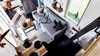 Modern home with Living Room, Sofa, Dark Hardwood Floor, and Wall Lighting. Living Room from Loft. Tru Form Tiny Photo 14 of Full Solar Tiny Home & Open Layout