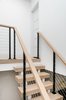 Modern home with Staircase. Top of stairs Photo 19 of The Doyle Residence