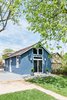 Modern home with Exterior, House Building Type, A-Frame RoofLine, Shingles Roof Material, and Wood Siding Material. Original painted cedar shaker exterior Photo 3 of From abandoned garage to Additional Dwelling Unit