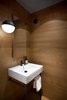Modern home with Bath Room, Medium Hardwood Floor, Pedestal Sink, Ceiling Lighting, and Pendant Lighting. Duravit sink & pedestal, Vola faucet, Flos String Light pendant Photo 20 of Beatty Street Loft