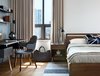 Modern home with Bedroom, Bed, Shelves, Night Stands, Table Lighting, Medium Hardwood Floor, and Chair. Catch Chair by &Tradition, walnut bed and bedside table Photo 15 of Beatty Street Loft