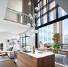Modern home with Kitchen, Undermount Sink, Medium Hardwood Floor, Dishwasher, Engineered Quartz Counter, Pendant Lighting, Wine Cooler, and Wood Cabinet. Bocci 28.16 Pendant Photo 3 of Beatty Street Loft