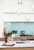 Modern home with Kitchen, Wood Cabinet, Engineered Quartz Counter, Wall Oven, Cooktops, Refrigerator, Glass Tile Backsplashe, Range Hood, White Cabinet, Pendant Lighting, Undermount Sink, and Medium Hardwood Floor. Herringbone glass tile from Interstyle Photo 2 of Beatty Street Loft