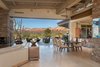 Modern home with Living Room, Floor Lighting, Sofa, Coffee Tables, Sectional, Travertine Floor, Wall Lighting, Ceiling Lighting, Gas Burning Fireplace, Medium Hardwood Floor, Chair, Light Hardwood Floor, End Tables, Table Lighting, and Pendant Lighting. Exquisite Indoor | Outdoor Living Photo of Sedona. Extraordinary. Serenity. Luxury. Green Living.