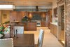 Modern home with Kitchen, Granite Counter, and Stone Counter. Gourmet Kitchen and Dining Photo 9 of Sedona. Extraordinary. Serenity. Luxury. Green Living.