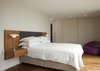 Modern home with Bedroom, Night Stands, and Bed. Headboard with integral Bedside Cabinets
• American walnut Headboard with integral upholstery
• Affixed modular beside cabinets with pull-out walnut drawers with oak interior
Photo 7 of 'Linear Living' with the latest project by William Garvey