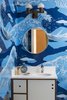 Modern home with Bath Room, Two Piece Toilet, Undermount Sink, Ceramic Tile Floor, Corner Shower, Wall Lighting, Engineered Quartz Counter, and Ceramic Tile Wall. Powder Bath Photo 16 of Glendale Mid Century