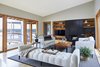 Modern home with Living Room. Living Room with Lake Views Photo 4 of The Splinter Creek Home