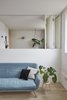 Modern home with Living Room, Sofa, Medium Hardwood Floor, Coffee Tables, and Pendant Lighting. Scandinavian furnishings bring a lived-in aesthetic to the living room Photo 4 of Hackney Mews House