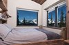 Modern home with Bedroom, Bed, Medium Hardwood Floor, Bookcase, Storage, and Ceiling Lighting. 1 or 3 Bedrooms Photo 9 of Smith Cabin Aspen