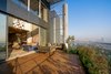 Modern home with Outdoor, Shrubs, Landscape Lighting, Metal Fences, Wall, Hardscapes, and Stone Patio, Porch, Deck. Landscaped Balcony: Extended Living space Photo 4 of Aurum Penthouse