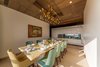 Modern home with Dining Room, Pendant Lighting, Chair, Storage, Table, Marble Floor, Ceiling Lighting, Accent Lighting, and Shelves. Daylit Dining Photo 5 of Aurum Penthouse