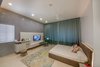 Modern home with Bedroom, Marble Floor, Night Stands, Shelves, Bed, Chair, Bookcase, Ceiling Lighting, and Rug Floor. Daughter's Bedroom Photo 10 of Aurum Penthouse