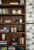 Modern home with Living Room and Bookcase. The built-in bookcase holds some of the instruments and books for the two young boys. Photo 2 of Balboa Residence