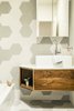 Modern home with Recessed Lighting and Accent Lighting. In the family bath, continuous tile crawls up from floor to wall, keeping the kids bath area seamless and simple. The floating vanity is made by Kaimade Woodworking with locally sourced walnut. Photo 18 of Balboa Residence