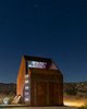 Modern home with Outdoor, Landscape Lighting, Wood Patio, Porch, Deck, Metal Patio, Porch, Deck, Boulders, Plunge Pools, Tubs, Shower, Desert, and Rooftop. Stargazing Portal Photo 5 of Folly | Off Grid
