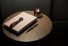 Modern home with Bedroom, Light Hardwood Floor, Night Stands, and Table Lighting. Closeup of the bedside guest journal. Photo 6 of Normal Heights Residence