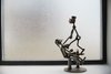 Modern home with Windows, Metal, and Picture Window Type. A dental surgery statue was a gift from a patient. Photo 19 of Normal Heights Residence