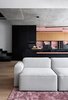 Modern home with Living Room. The living room embraces with its soft and cozy zone for listening to music and watching movies on the projector.As the apartment owner is passionate about listening to the music and is proud of his 3000 vinyl records collection, we designed a unique rack for his collection. Photo 4 of VOV apartment