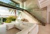 Modern home with Living Room, Porcelain Tile Floor, Ceiling Lighting, Chair, Sectional, and End Tables. It was this view that made us buy the house !! Photo 19 of Casa Ilios (Seven Bedrooms)