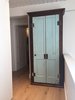 Modern home with Colorful Cabinet. Fabulous antique cupboard Photo 14 of Modern Riverfront Townhouse in Aspen