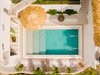 Modern home with Outdoor, Swimming Pools, Tubs, Shower, Large Pools, Tubs, Shower, Concrete Pools, Tubs, Shower, and Side Yard. The pool from above Photo 2 of Casa Ilios (Seven Bedrooms)