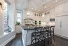 Modern home with Kitchen, White Cabinet, and Dark Hardwood Floor. Kitchen Photo 2 of Stylish Chicago home asks $2.79M