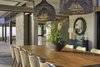 Modern home with Dining Room, Pendant Lighting, Porcelain Tile Floor, and Table. Dining area Photo 2 of Manini`owali 3