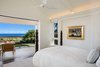 Modern home with Bedroom, Recessed Lighting, Bed, and Dark Hardwood Floor. Master Bedroom Photo 18 of Manini`owali Villa 5