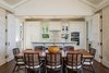 Modern home with Dining Room, Dark Hardwood Floor, and Table. Dining Area & Kitchen Photo 11 of Manini`owali Villa 5