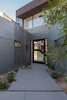 Modern home with Staircase, Metal Tread, and Wood Railing. Courtyard Photo of The Rubber Ducky Trail House