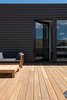 Modern home with Outdoor, Wood Patio, Porch, Deck, Horizontal Fences, Wall, Rooftop, Small Patio, Porch, Deck, Metal Fences, Wall, and Landscape Lighting. master suite balcony Photo 3 of The Rubber Ducky Trail House